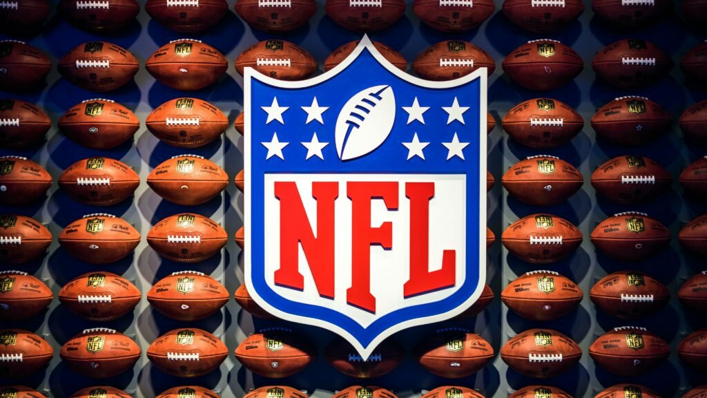 NFL logo and footballs