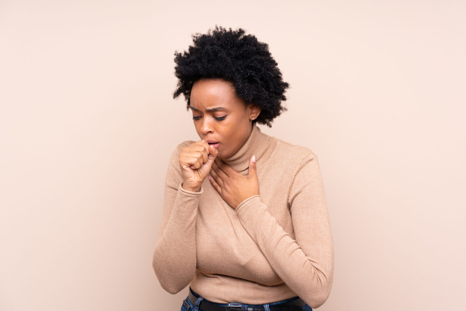 African american woman over isolated background is suffering with cough and feeling bad 2023/04/AdobeStock_328076564.jpeg 