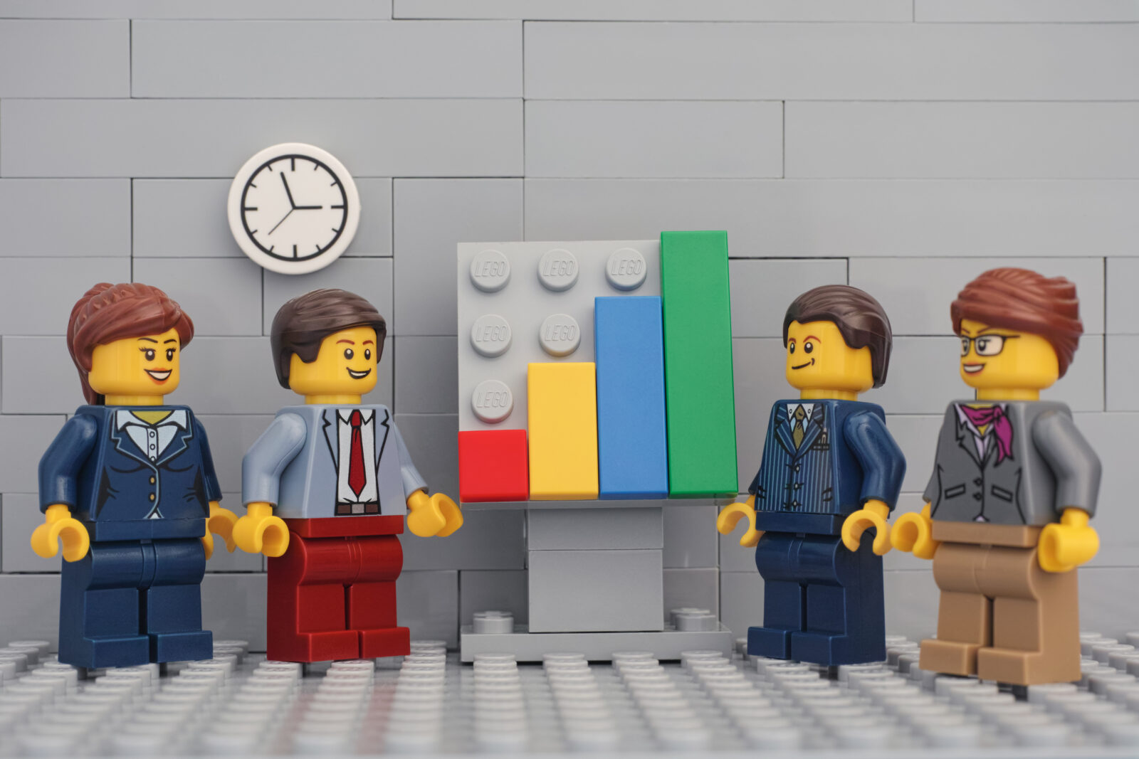 Tambov, Russian Federation - November 23, 2019 Lego minifigure businessmen having a meeting and discussing graphs showing the results of their successful teamwork. 2023/05/AdobeStock_305532744_Editorial_Use_Only.jpeg 