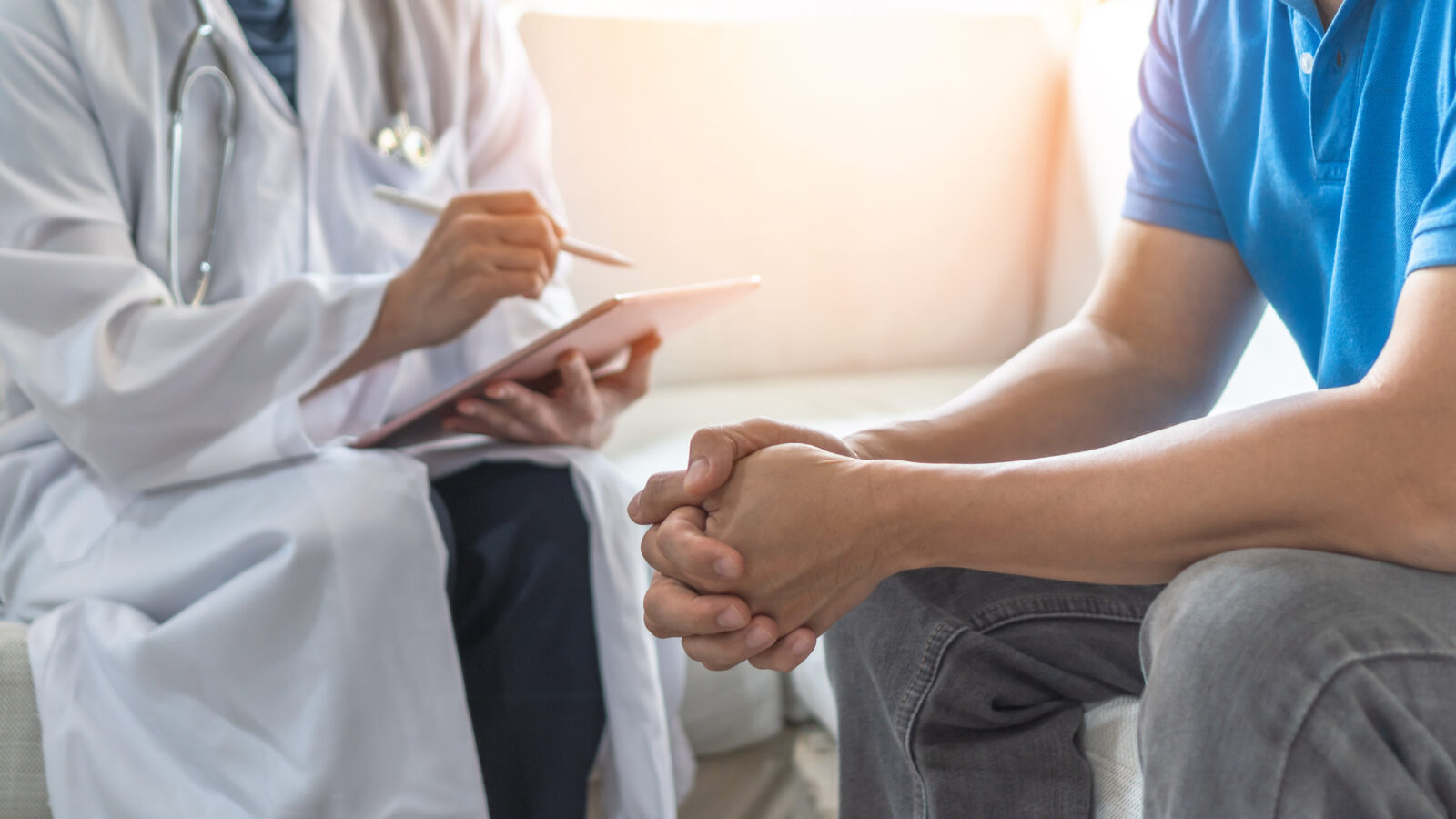 Men's health exam with doctor or psychiatrist working with patient having consultation on diagnostic examination on male disease or mental illness in medical clinic or hospital mental health service 2024/03/AdobeStock_284541276.jpeg 