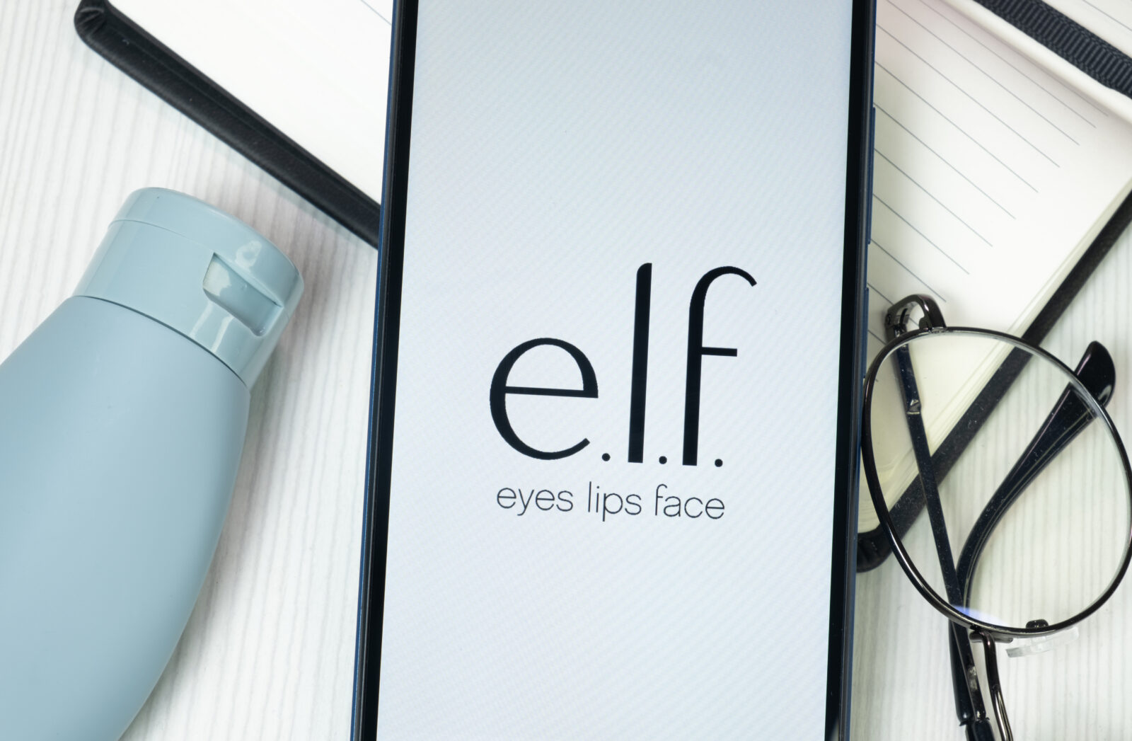 New York, USA - 30 June 2024: e.l.f. Logo on Phone Screen, eyes lips face Company Icon. 2024/07/AdobeStock_874114484_Editorial_Use_Only.jpeg 