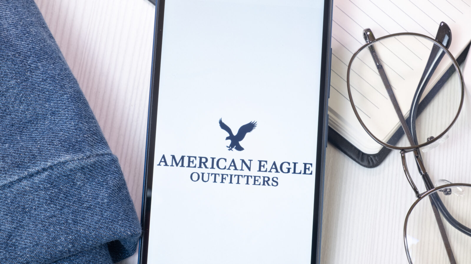 New York, USA - 21 June 2024: American Eagle Outfitters Logo on Phone Screen, Company Icon. 2024/09/AdobeStock_861992497_Editorial_Use_Only.jpeg 