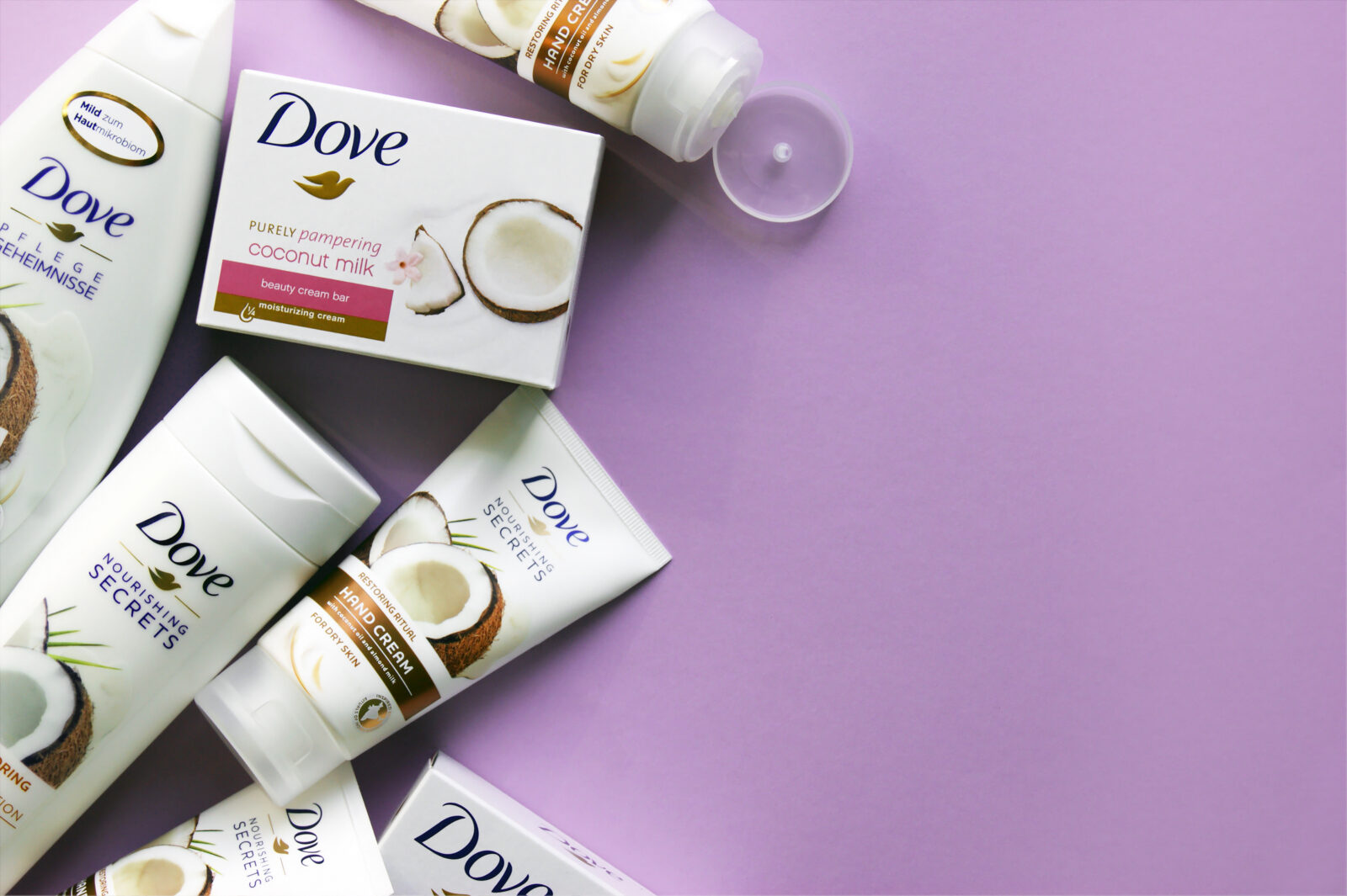 KHARKOV, UKRAINE - MARCH 4, 2020 : Dove products, shower gel, shampoo, body milk, soap, hand cream with coconut milk. Introduced to the British market in 1955, Dove is a personal care brand. 2024/11/AdobeStock_411915910_Editorial_Use_Only.jpeg 