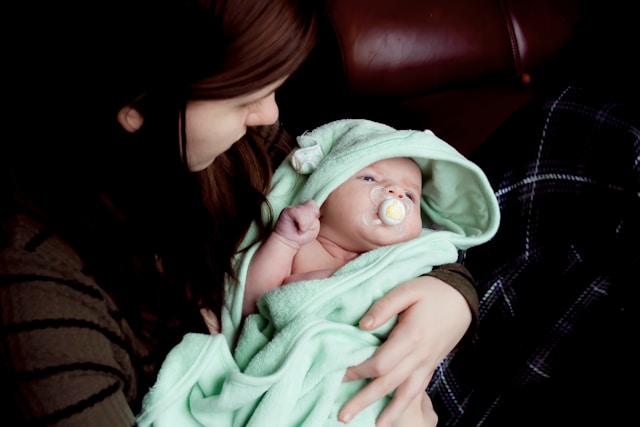 Woman holding her baby