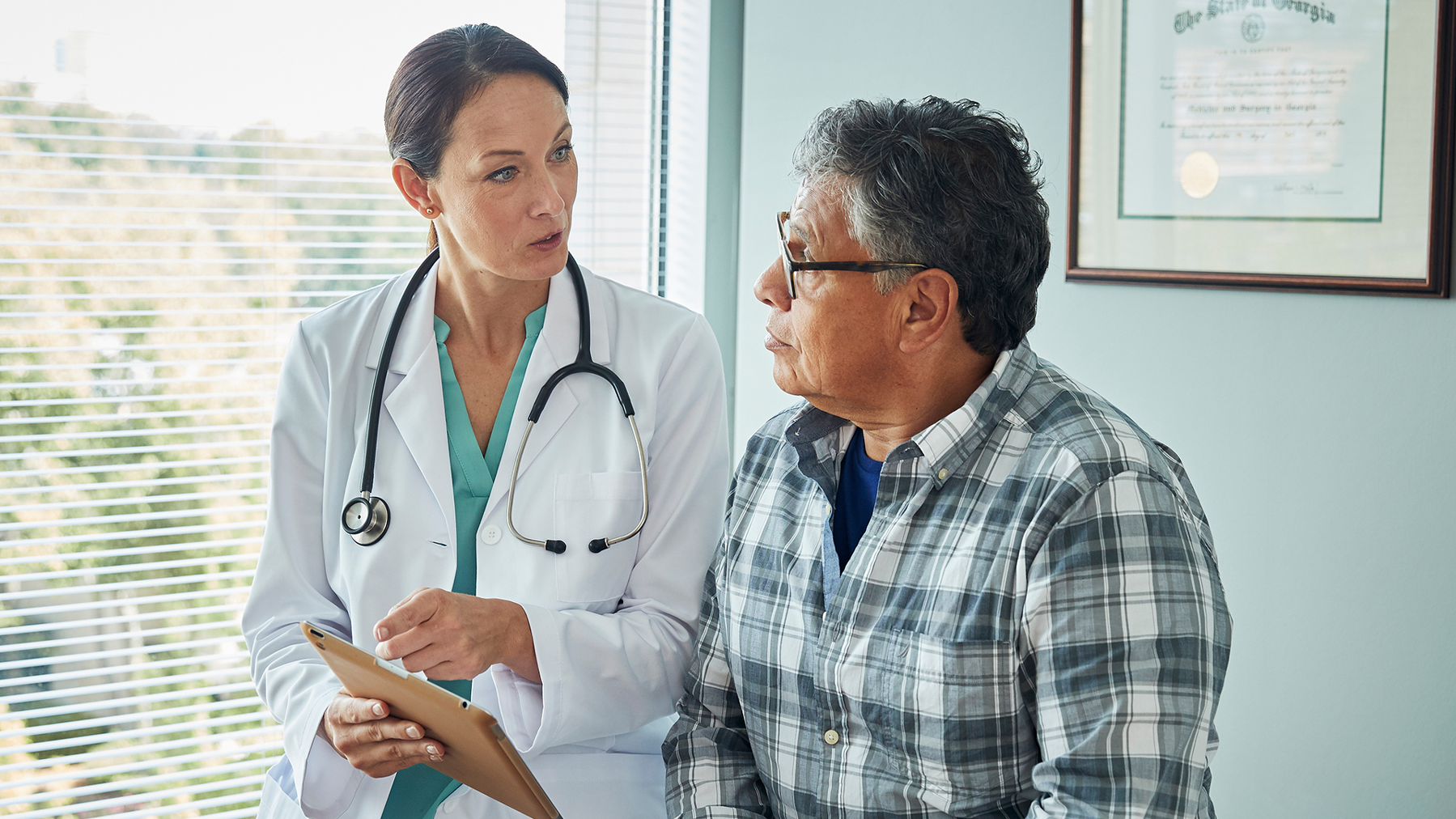 Doctor talking to patient