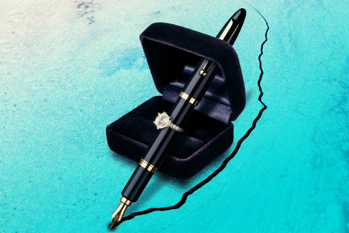 Image of a ring in a box around a pen
